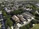 Aerial view showcases a neighborhood with well-maintained homes and landscaping at 3065 E Tamarisk St, Gilbert, AZ 85296