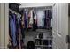 Walk-in closet with organized shelving, clothing racks, and ample storage space at 3065 E Tamarisk St, Gilbert, AZ 85296
