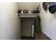 Storage closet features ample shelving and clothing rack at 3065 E Tamarisk St, Gilbert, AZ 85296