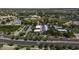 Overhead view of the commercial district featuring buildings, landscaping, parking and street access at 3065 E Tamarisk St, Gilbert, AZ 85296