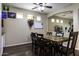 Elegant dining room featuring hardwood floors and a stylish table, ideal for Gathering gatherings at 3065 E Tamarisk St, Gilbert, AZ 85296