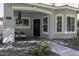 Welcoming front porch with ample seating, creating a cozy and inviting entrance at 3065 E Tamarisk St, Gilbert, AZ 85296