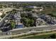 An aerial view showcases a vibrant community with a mix of housing, green spaces, and manicured landscapes at 3065 E Tamarisk St, Gilbert, AZ 85296
