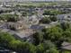 An aerial shot of a meticulously landscaped residential neighborhood with mature trees and well-maintained homes at 3065 E Tamarisk St, Gilbert, AZ 85296
