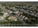 Neighborhood aerial view featuring a mix of architectural styles, mature trees lining the streets, and well-kept landscaping at 3065 E Tamarisk St, Gilbert, AZ 85296