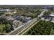 This aerial view showcases charming, colorful townhomes, each with a solar panel roof and pristine landscaping at 3065 E Tamarisk St, Gilbert, AZ 85296