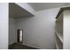 Unfinished storage room features ample shelving at 3065 E Tamarisk St, Gilbert, AZ 85296