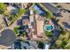Overhead view of expansive property featuring a pool, manicured lawns, and well-maintained landscaping at 3118 W Glenhaven Dr, Phoenix, AZ 85045