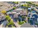 Expansive aerial view of estate showcasing large home, pool, tennis court, lush landscaping, and surrounding neighborhood at 3118 W Glenhaven Dr, Phoenix, AZ 85045