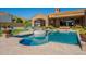 This backyard pool features a spa and outdoor lounge area, great for enjoying time outside at 3118 W Glenhaven Dr, Phoenix, AZ 85045