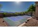 Private basketball court in backyard featuring mountain views and privacy landscaping at 3118 W Glenhaven Dr, Phoenix, AZ 85045