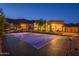 View of the multi-use basketball and tennis court with mountain views at 3118 W Glenhaven Dr, Phoenix, AZ 85045