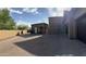 Spacious driveway featuring paved stones and desert landscaping leads to a stone-accented home with a detached garage at 3118 W Glenhaven Dr, Phoenix, AZ 85045