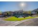 Beautiful single-story home features lush green lawn, mature trees, and a welcoming front entrance walkway at 3118 W Glenhaven Dr, Phoenix, AZ 85045