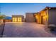 Spacious multi-car garage with a large driveway and ample parking. Additional storage building with glass doors at 3118 W Glenhaven Dr, Phoenix, AZ 85045