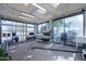 Greenhouse with full view of plants, benches, rolling cart, sink, and large sliding glass doors at 3118 W Glenhaven Dr, Phoenix, AZ 85045