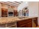 Granite countertops and stainless steel appliances make this kitchen perfect for cooking and entertaining at 3118 W Glenhaven Dr, Phoenix, AZ 85045