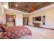 Main bedroom with TV, a ceiling fan, and an en suite bathroom at 3118 W Glenhaven Dr, Phoenix, AZ 85045