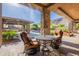 Relaxing outdoor area provides great views of the barbecue area, luxurious pool and mountain vistas at 3118 W Glenhaven Dr, Phoenix, AZ 85045