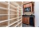 Spacious pantry area with ample shelving, cabinetry, and counter space at 3118 W Glenhaven Dr, Phoenix, AZ 85045