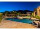 Backyard swimming pool and spa, perfect for hot summer days, and desert views at 3118 W Glenhaven Dr, Phoenix, AZ 85045