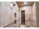 Modern tile shower with dual shower heads, built-in nooks, a bench and glass doors at 3118 W Glenhaven Dr, Phoenix, AZ 85045