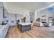 Spacious living area with a modern kitchen, creating an inviting open-concept design at 3335 W Desert Dawn Dr, Phoenix, AZ 85083