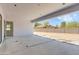 View of the patio overlooking backyard with block wall and desert landscape at 3335 W Desert Dawn Dr, Phoenix, AZ 85083