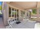 Back patio with views of the landscaped yard, shade, and lots of room to relax at 3544 N Paseo Del Sol --, Mesa, AZ 85207