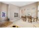 Spacious dining room with glass-top table, neutral decor, and bright lighting at 3544 N Paseo Del Sol --, Mesa, AZ 85207
