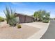 Charming desert home with a three car garage, gravel yard, and native plant landscaping at 3544 N Paseo Del Sol --, Mesa, AZ 85207
