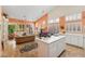 Bright, open-concept living space with a tan sofa, high ceilings, and large windows with shutter-style blinds at 3544 N Paseo Del Sol --, Mesa, AZ 85207