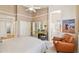 Spacious main bedroom with ensuite bathroom, plush carpeting, and ample natural light at 3544 N Paseo Del Sol --, Mesa, AZ 85207