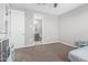 Bright bedroom with soft carpet, ample natural light, and calming neutral tones at 37645 W Santa Clara Ave, Maricopa, AZ 85138