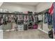 Large walk-in closet with ample shelving and hanging space, providing organized storage solutions at 37645 W Santa Clara Ave, Maricopa, AZ 85138