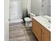 Bathroom featuring a standing shower, new flooring, and a modern vanity at 3810 N Maryvale Pkwy # 1070, Phoenix, AZ 85031