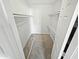 Walk-in closet with shelving and carpet at 3810 N Maryvale Pkwy # 1070, Phoenix, AZ 85031