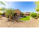 Landscaped backyard with gravel and artificial turf at 43303 N 44Th Ave, New River, AZ 85087