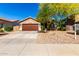 Charming single-story home with desert landscaping and a well-maintained front yard at 43303 N 44Th Ave, New River, AZ 85087