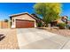 Beautiful single-story home with a 2-car garage and low-maintenance desert landscaping at 43303 N 44Th Ave, New River, AZ 85087