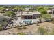 Aerial view of a home with a fenced pool area and desert landscaping in a residential community at 4772 E Agave Ln, Cave Creek, AZ 85331