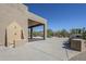 Outdoor shower and BBQ area near pool and covered patio, perfect for outdoor living at 4772 E Agave Ln, Cave Creek, AZ 85331