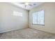 Bedroom with ceiling fan, and lots of natural light at 4772 E Agave Ln, Cave Creek, AZ 85331