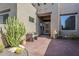 Inviting desert-style home entrance with seating area and native landscaping at 4772 E Agave Ln, Cave Creek, AZ 85331