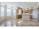 Sunlit kitchen featuring granite countertops, stainless steel appliances and large windows at 4772 E Agave Ln, Cave Creek, AZ 85331