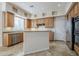 Well-lit kitchen featuring stainless steel appliances, granite countertops, and custom cabinets at 4772 E Agave Ln, Cave Creek, AZ 85331