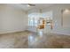 Open living area with access to the kitchen, ample natural light, and tile floors for easy maintenance at 4772 E Agave Ln, Cave Creek, AZ 85331