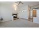 Living room showcases a fireplace, neutral tones, and seamless transitions to other living spaces at 4772 E Agave Ln, Cave Creek, AZ 85331