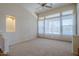 Bright living room with high ceilings and large windows, creating a spacious feel at 4772 E Agave Ln, Cave Creek, AZ 85331