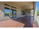 Spacious covered patio with sliding doors leading indoors, perfect for entertaining and relaxation at 4772 E Agave Ln, Cave Creek, AZ 85331